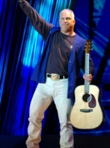 Garth Brooks, tipping his hat.